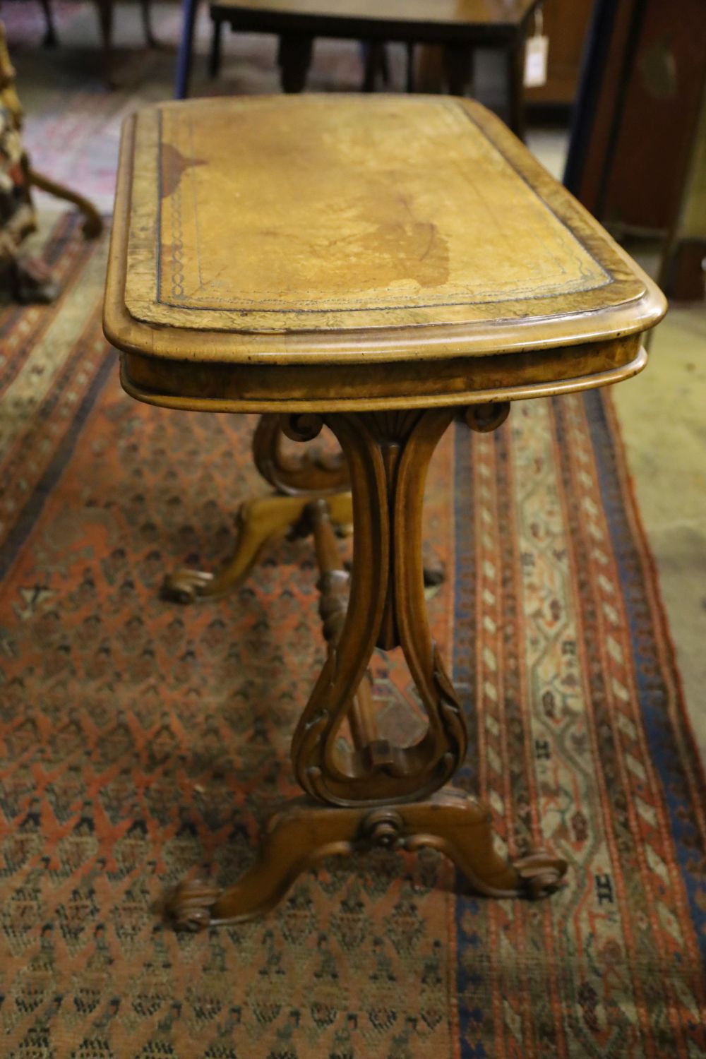 A Victorian walnut writing table, width 68cm, depth 42cm, height 70cm